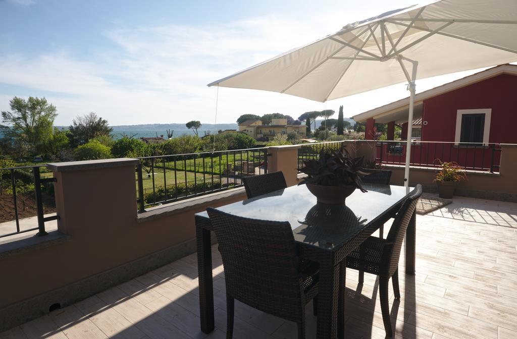 Casa Vacanze I Melograni Trevignano Romano Szoba fotó